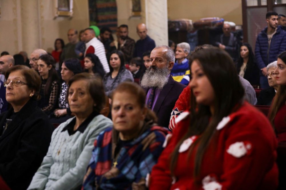 Christians attend a mass on Christmas Eve, amid the Israel-Hamas conflict, at the Holy Family Church in Gaza City, December 24, 2024. — Reuters pic  