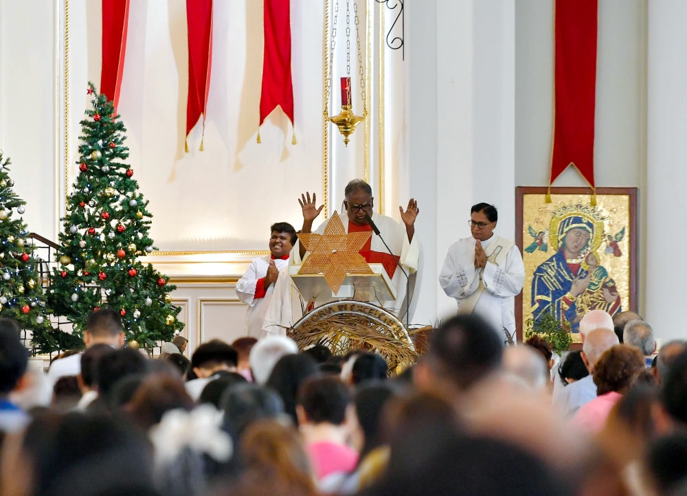 Christmas celebration at the Cathedral of St John The Evangelist Church in Kuala Lumpur today. — Bernama pic