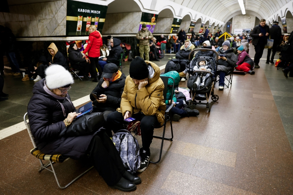 People take shelter at a metro station during an air raid alert, amid Russia's attack on Ukraine, in Kyiv December 25, 2024. — Reuters pic  