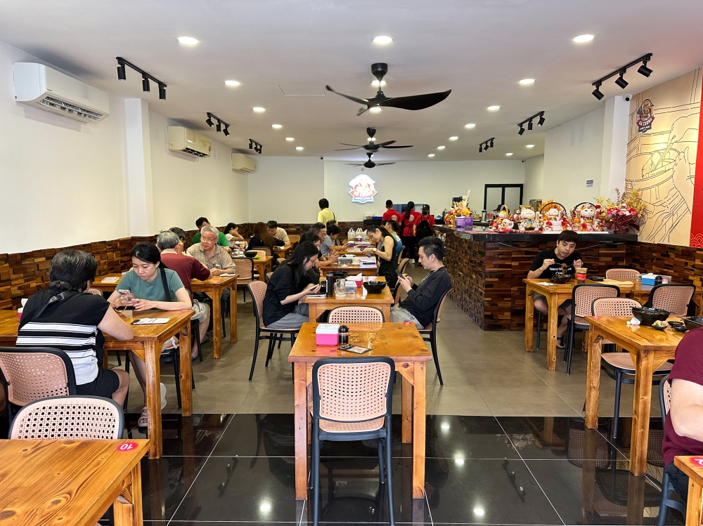 The restaurant has a stream of customers walking in during breakfast and lunch time — Picture by Lee Khang Yi