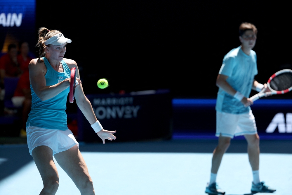 Kazakhstan's Elena Rybakina and Alexander Shevchenko hit a return to Spain's Pablo Carreno Busta and Yvonne Cavalle-Reimers during their mix doubles match at the United Cup tennis tournament in Perth December 27, 2024. — AFP pic