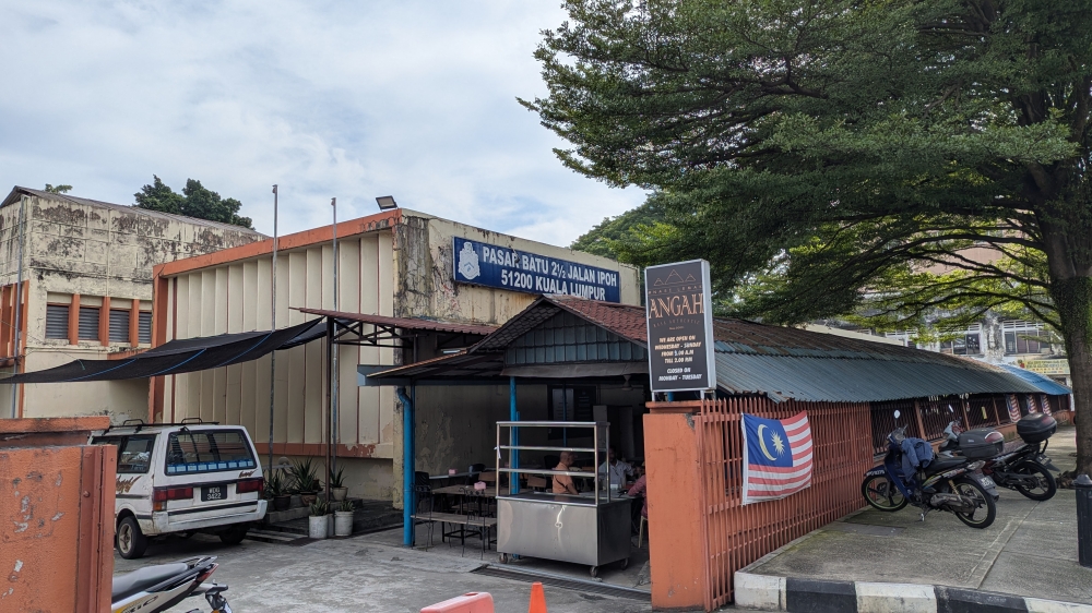 Nasi Lemak Angah is located inside Pasar Batu 2 ½ off Jalan Ipoh. — Picture by Ethan Lau