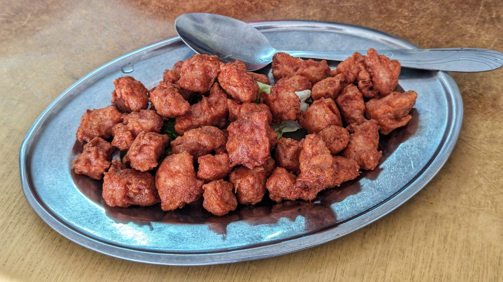 The Red Beancurd Fried Pork is a good snacking option — Picture by Ethan Lau

