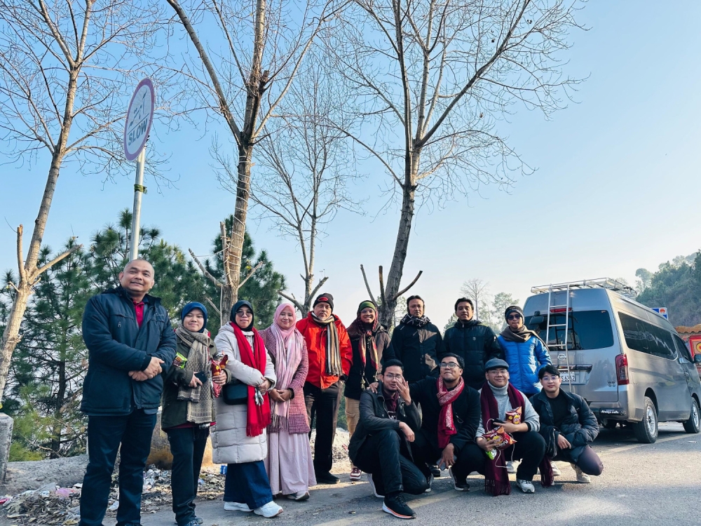 The author (fourth from left) with Universiti Malaya delegates for the international conference in Islamabad, Pakistan. — Picture courtesy of Wan Afiqah AnisWan Ahmad 