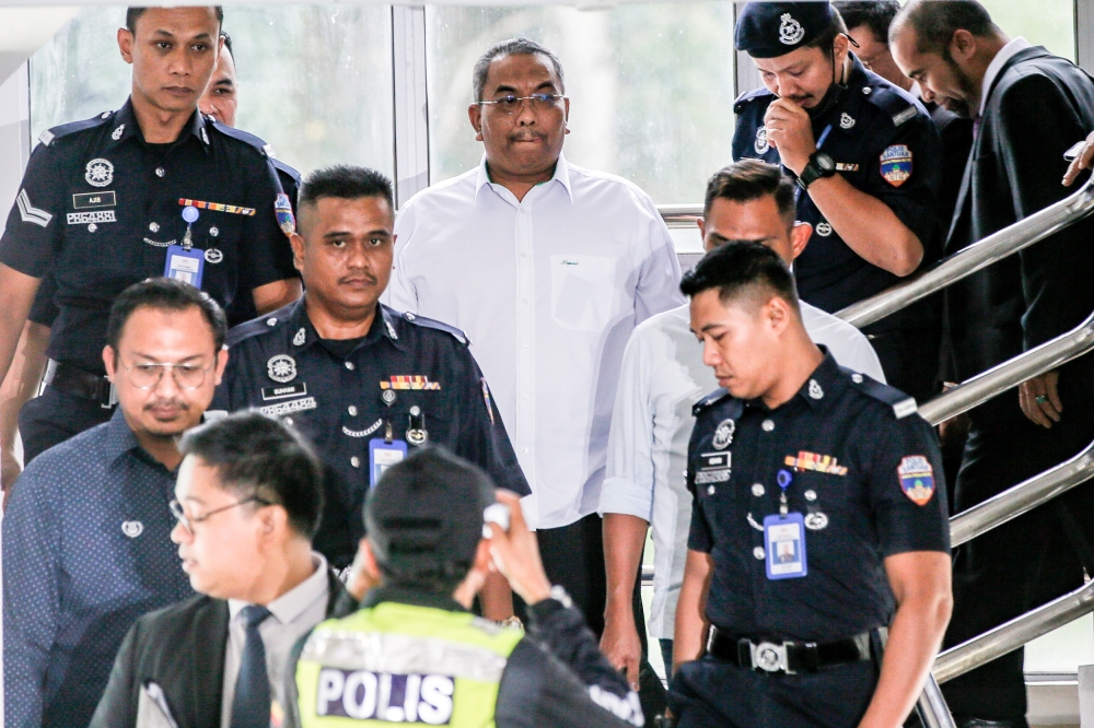 Datuk Muhammad Sanusi Md Nor leaves the Selayang court complex in this file picture dated July 18, 2023. — Picture by Hari Anggara