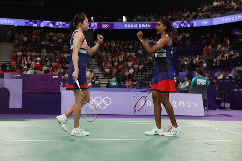 Pearly Tan and M Thinaah became the first Malaysian women’s doubles badminton pair to reach the semi-finals of the Olympics. — Bernama pic