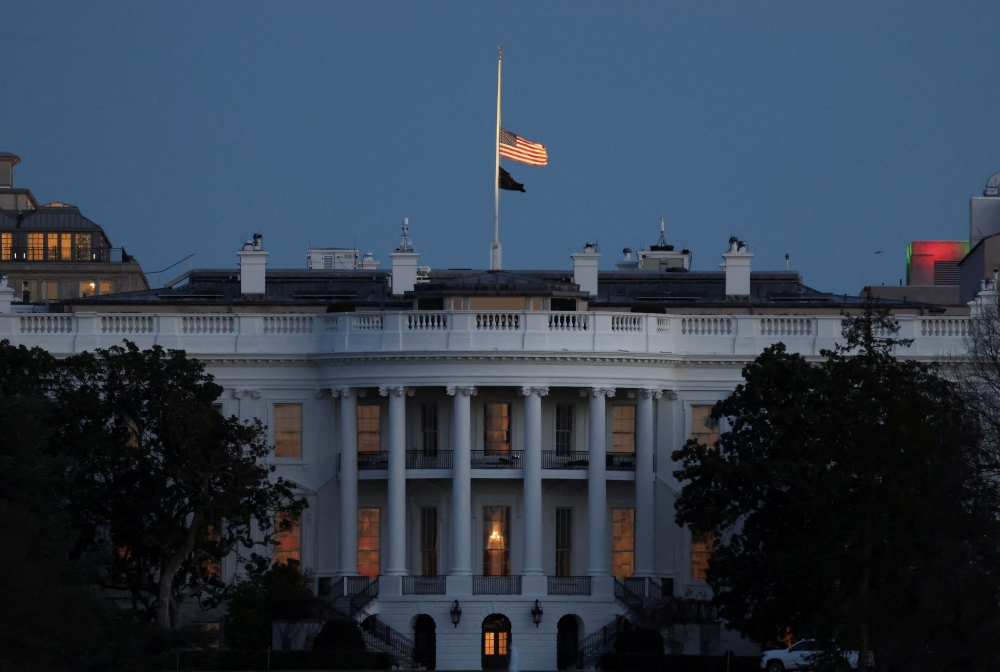 The flag over the White House flies at half-staff following the death of former U.S. President Jimmy Carter, in Washington December 30, 2024. — Reuters pic  