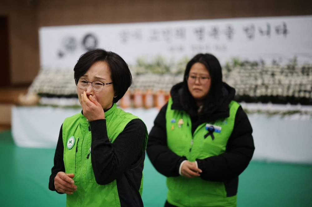 Lee Kwi-sun, who knew a government official of Jeollanam-do Office of Education who died in the Jeju Air crash at Muan International Airport, reacts after mourning in Muan, South Korea, December 31, 2024. — Reuters pic  