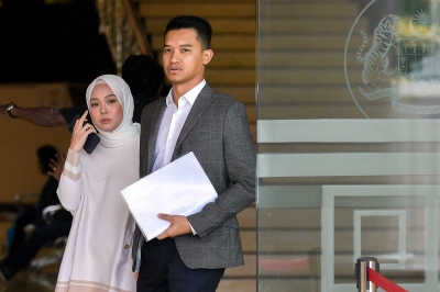 On trial over FashionValet’s RM8m funds, Vivy Yusof and husband get back passports to perform umrah