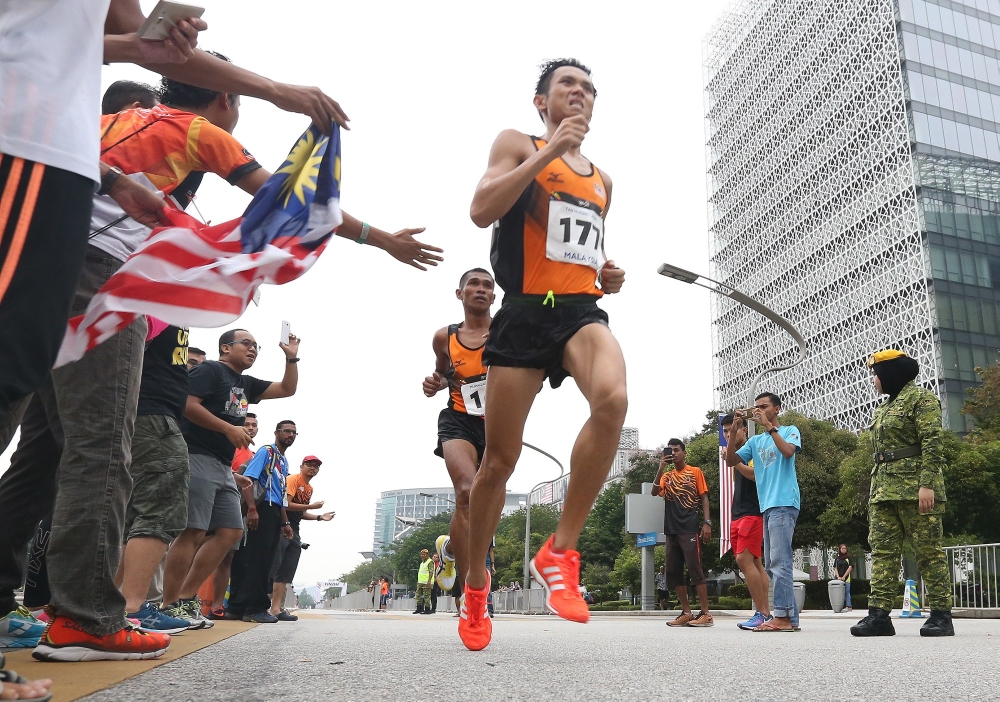 A file photograph shows participants at the Putrajaya Marathon. — Picture by Razak Ghazali