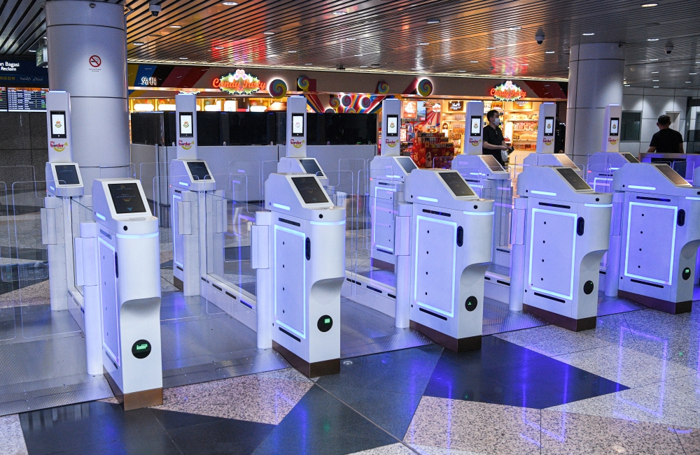 The upgraded QR code autogates at KLIA Terminal 1. — Bernama pic