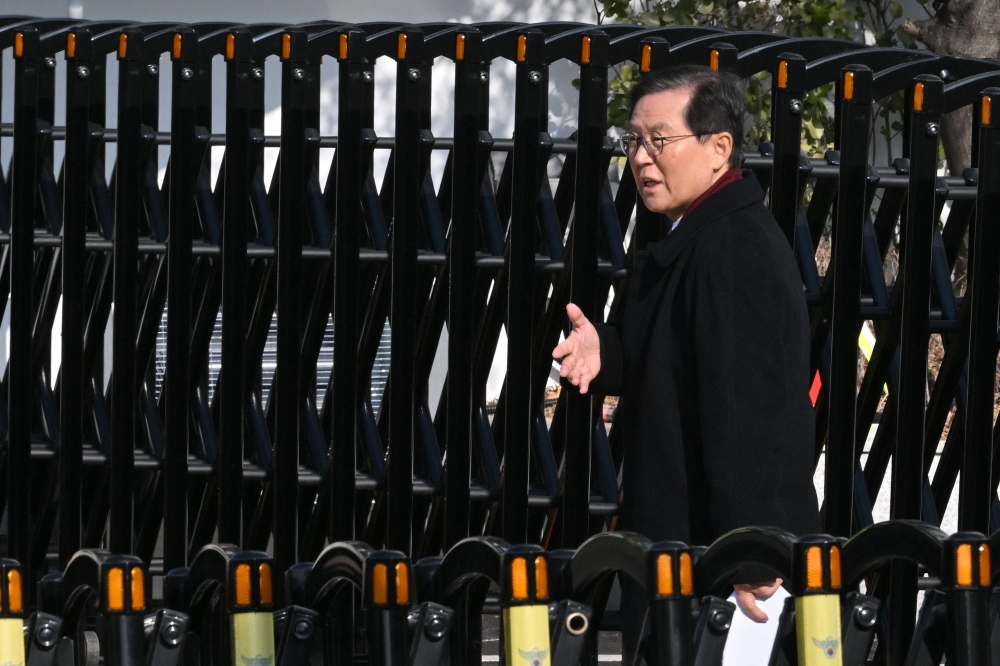 Yoon Kap-keun, lawyer for South Korea's impeached President Yoon Suk-yeol, arrives at Yoon Suk-yeol's residence in Seoul on January 3, 2025. — AFP pic