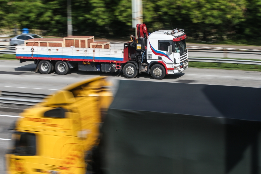 During festive seasons, such as just before and after Hari Raya Aidilfitri and Chinese New Year, the government typically issues and gazettes bans on lorries or limits the hours they can be on the road to reduce traffic jams and the risk of road accidents. — Picture by Yusof Mat Isa