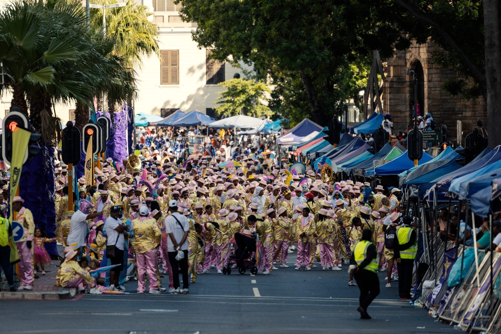 A general view of Kaapse Klopse minstrels dancing as their troupe moves forward during the annual Kaapse Klopse parade, also known as ‘Tweede Nuwe Jaar’ (second New Year), in Cape Town on January 4, 2025. — AFP pic