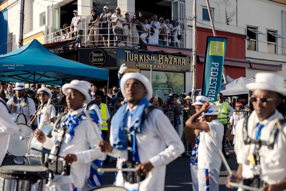 Kaapse Klopse minstrels dance as their troupe moves forward during the annual Kaapse Klopse parade, also known as ‘Tweede Nuwe Jaar’ (second New Year), in Cape Town on January 4, 2025. — AFP pic