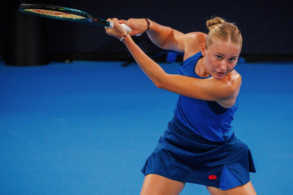 Russia's Polina Kudermetova hits a return to Belarus' Aryna Sabalenka during their women's singles final match at the Brisbane International tennis tournament on Pat Rafter Arena in Brisbane January 5, 2025. — AFP pic