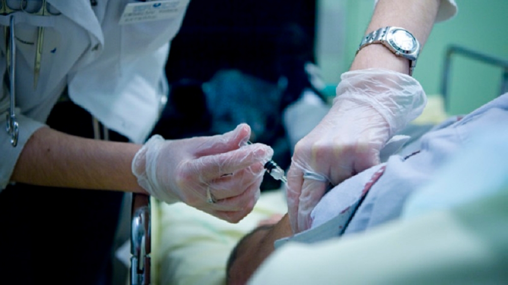 A medical worker administers an injection in this file photo. — AFP pic