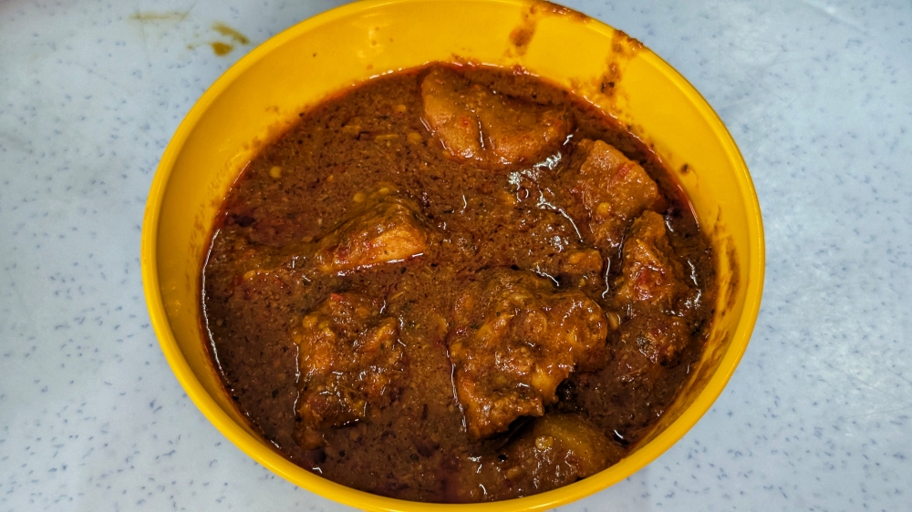 The chicken curry is thick and comforting — Picture by Ethan Lau