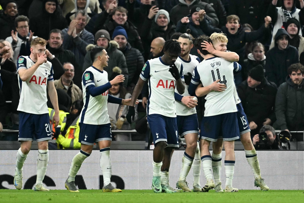 Tottenham Hotspur’s Lucas Bergvall (right) celebrates scoring the opening goal. — AFP