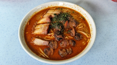 Indulge in a Nyonya ‘laksa’ topped with ‘siew yoke’ and ‘siham’ at Lim Ji Nyonya Laksa in Bercham, Ipoh