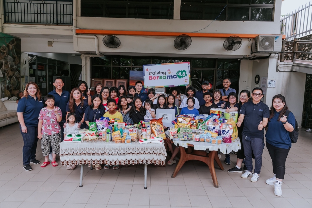 CapitaLand staff volunteers delivering donation items to Rumah Charis in Kuala Lumpur. — Picture courtesy of CapitaLand