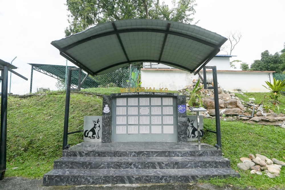 A memorial with the names of deceased canines who have dedicated their lives for public service. — Picture by Raymond Manuel