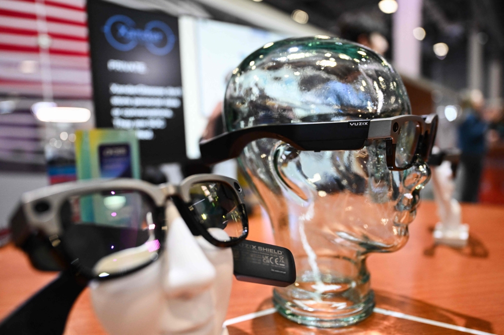 The Xander glasses for real-time offline captioning of conversation audio for the hearing impaired is displayed during the Consumer Electronics Show (CES) in Las Vegas January 7, 2025. — AFP pic