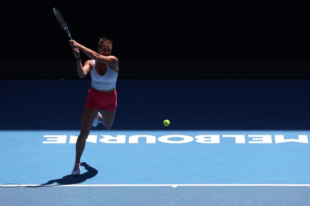 Belarus’ Aryna Sabalenka hits a return during a practice session. — AFP