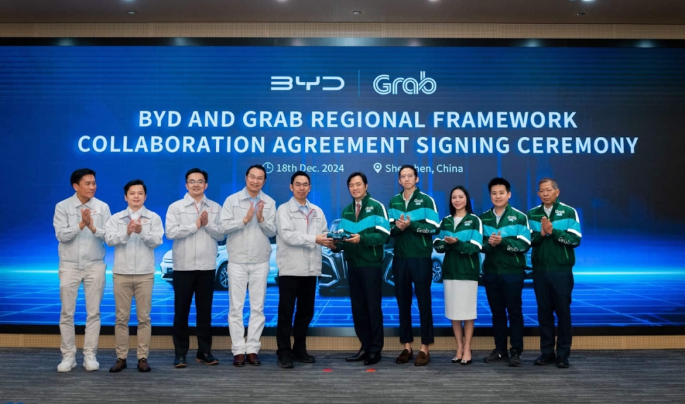 Grab and BYD  said the new collaboration will also involve technology integration between both companies. — SoyaCincau pic