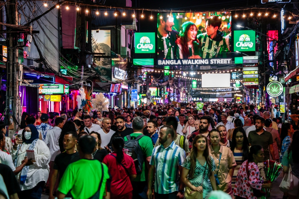 Tourists walk down Bangla Walking Street in Phuket, Thailand, November 22, 2024. — Reuters pic