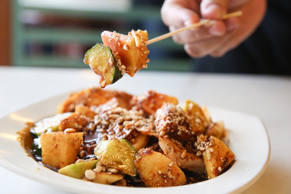 Rojak is usually a mix of fruits, vegetables and fritters, topped with sweet and savoury sauce. — Picture by Choo Choy May