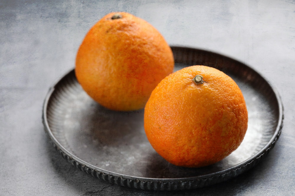 Auspicious mandarin oranges infuse some zest to the cookies — Picture by CK Lim