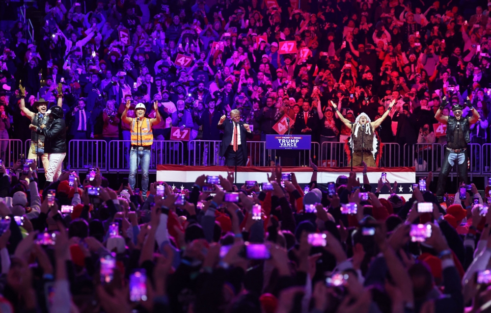 US President-elect Donald Trump dances onstage as the Village People perform during a rally the day before he is scheduled to be inaugurated for a second term, in Washington January 19, 2025. — Reuters pic  