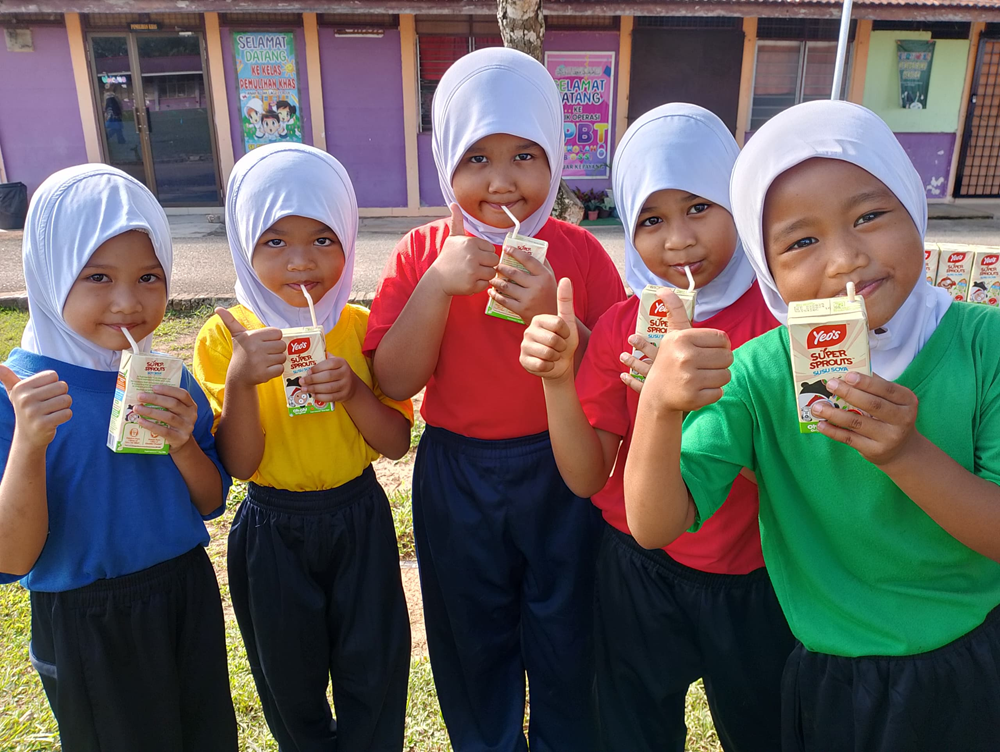 School children enjoying the nutritious Yeo’s SuperSprouts™ Soy Milk after their School Sports Day. — Picture courtesy of Yeo’s 