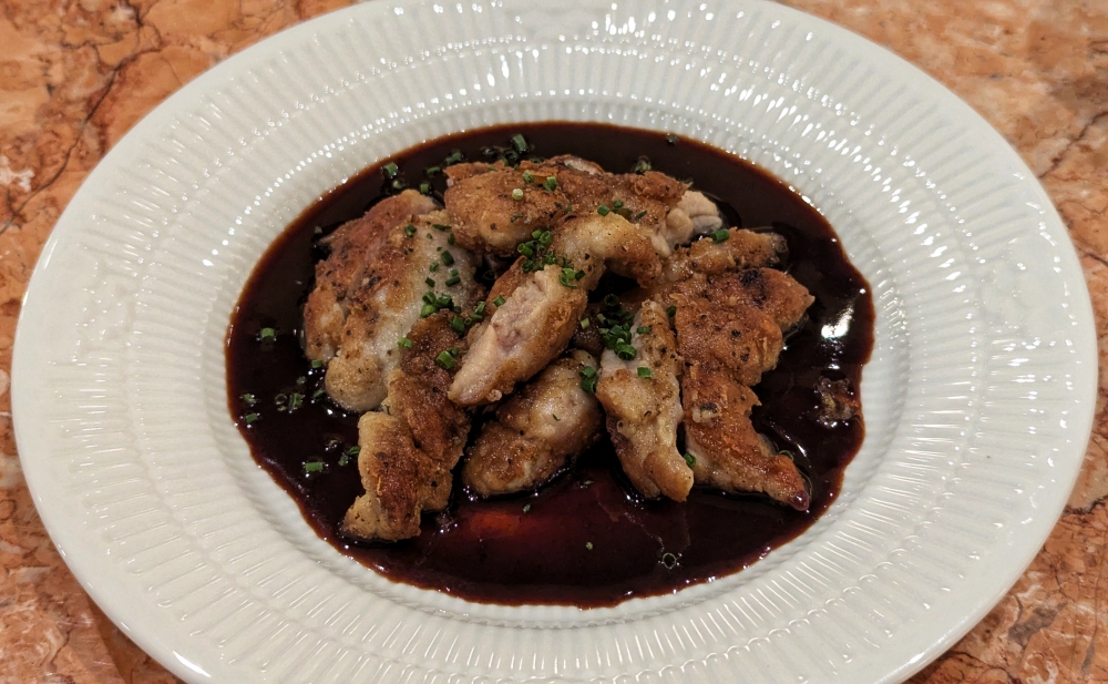 Ris de Veau, pan-fried veal sweetbreads in the perfect red wine sauce. — Picture by Ethan Lau