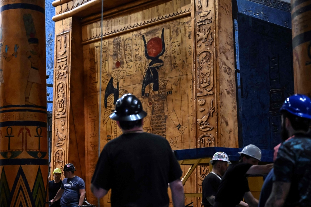 Stage hands move set pieces backstage for Giuseppe Verdi’s ‘Aida’ at New York’s Metropolitan Opera on January 14, 2025. — AFP pic