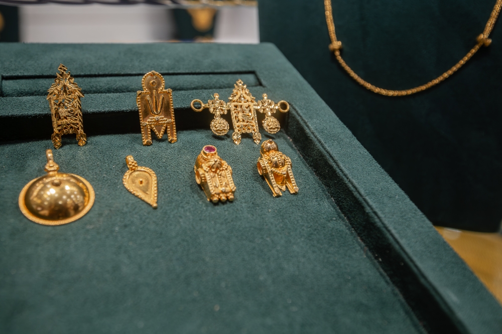 Top row (from left): Chettiar caste ‘thali’, ‘sulum thali’ and Nattukottai Chettiar caste ‘thali’, followed by bottom row (from left): ‘pottu thali’ for Telugus, leaf-shaped ‘thali’ for Malayalees, the Gounder caste ‘thali’ and the Pillaiyar ‘thali’. — Picture by Raymond Manuel