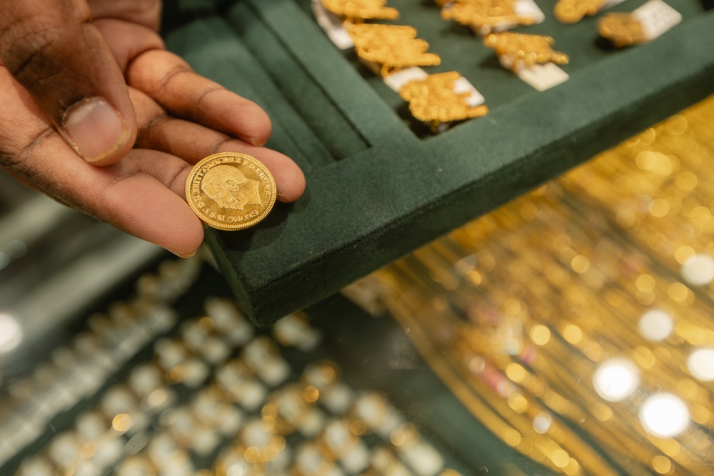 Datuk Vikness Raju, owner of Lalal Gold and Kanika Gold jewellery stores, say some married women add gold coins to their ‘thali’ chain whenever they have the financial means, as it is believed to grant their spouses a long life. — Picture by Raymond Manuel