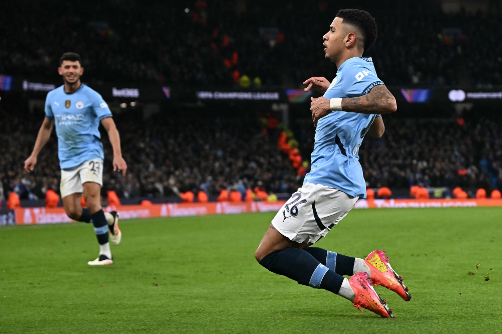 Manchester City's Brazilian midfielder Savinho celebrates scoring the team's third goal during the UEFA Champions League football match with Club Brugge at the Etihad Stadium in Manchester, north west England, on January 29, 2025. — AFP pic