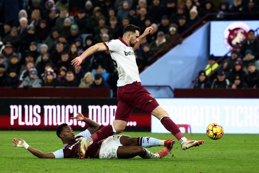 Aston Villa's Colombian striker Jhon Duran battles for the ball with West Ham United's English defender Maximilian Kilman. — AFP pic