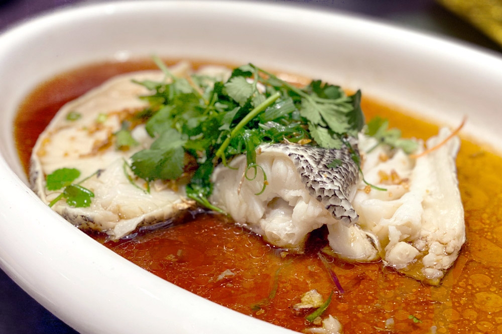 Steamed Canadian Cod with Deep Fried Garlic and Homemade Soy Sauce — Picture by CK Lim