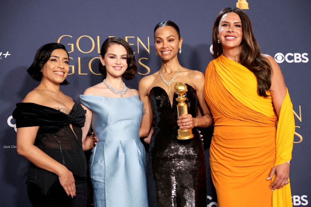 Adriana Paz, Selena Gomez, Karla Sofia Gascon, and Zoe Saldana, winners of the Best Motion Picture — Musical or Comedy award for ‘Emilia Perez,’ pose at the 82nd Golden Globe Awards in Beverly Hills, California January 5, 2025. — Reuters pic  