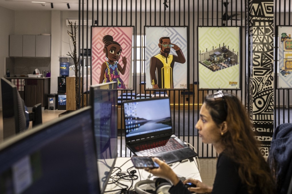 A worker looks at her computer in Maliyo office in Lagos on January 20, 2025. The sector is still in its infancy, but they see great potential in a country where 70 per cent of people are aged under 30 — and with one of the fastest-growing populations in the world. — AFP pic