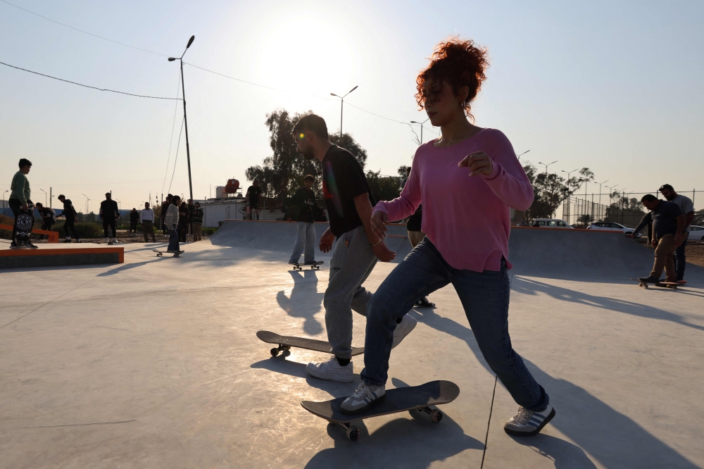 Iraqi skaters show their skills at a skatepark in Baghdad on February 1, 2025. The community skatepark, which is the first of it's kind in Iraq, opened to the public on February 1, 2025. — AFP pic