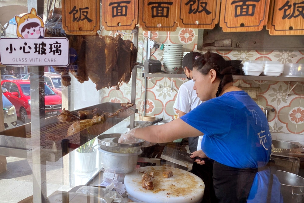 Prep station where the various braised meats are sliced — Picture by CK Lim.