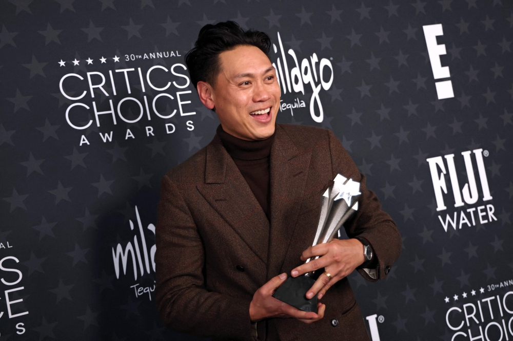 US filmmaker Jon M. Chu poses with the Best Director Award for ‘Wicked’ in the press room during the 30th Annual Critics Choice Awards at Barker Hangar in Santa Monica, California February 7, 2025. — AFP pic