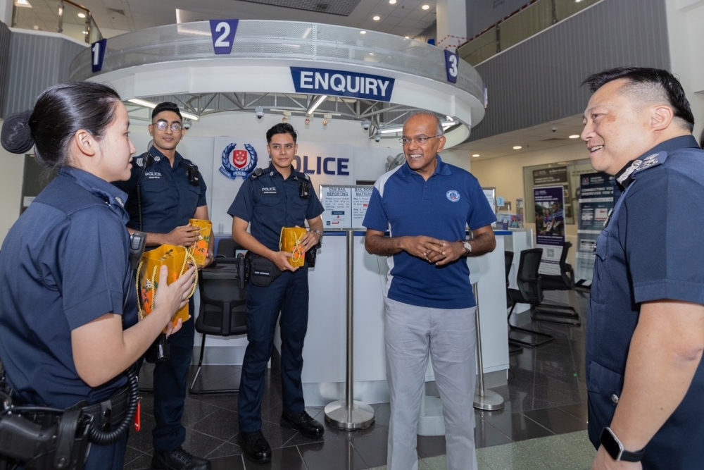 Singapore Minister K. Shanmugam (2nd right) speaking with Singapore Police Forces Tanglin Division. — Picture from Facebook/K Shanmugam