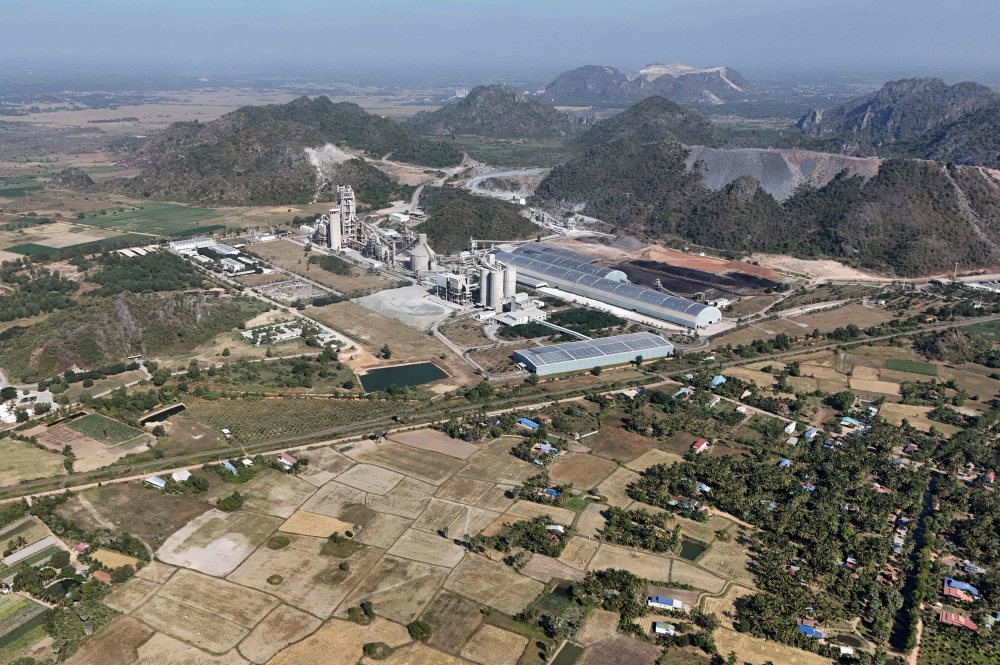 This aerial picture taken on January 10, 2025 shows a general view of a village near the Chip Mong Insee cement factory in Kampot province. — AFP pic