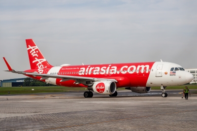 Police arrest foreign couple after erratic behaviour on China-bound AirAsia flight