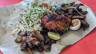 At Kota Damansara’s Stesen Nasi Kerabu, lines form out the door for the irresistible combination of ‘nasi kerabu’ with ‘lemak bakar’ and ‘ayam bakar’